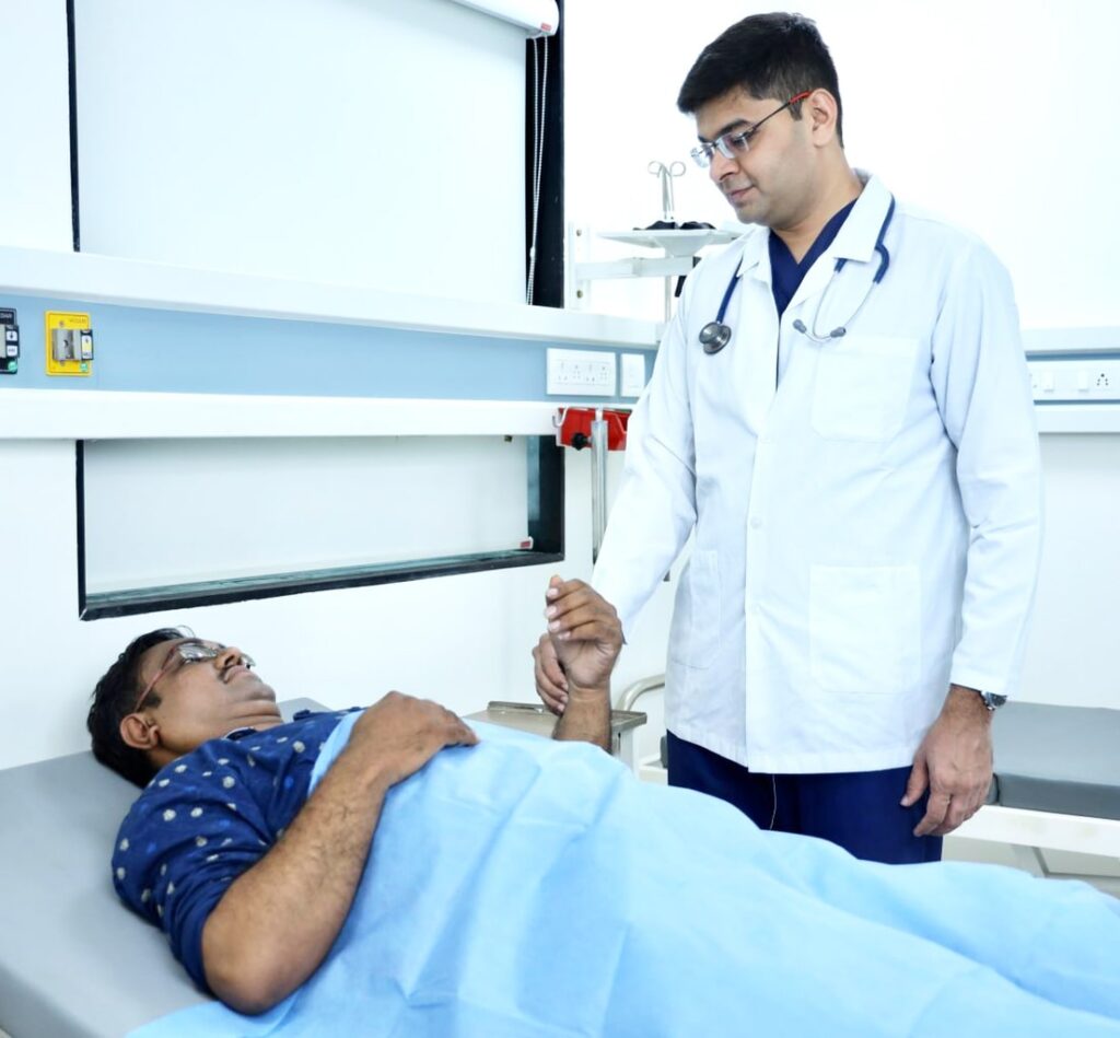 Dr Rohan Patil with patient